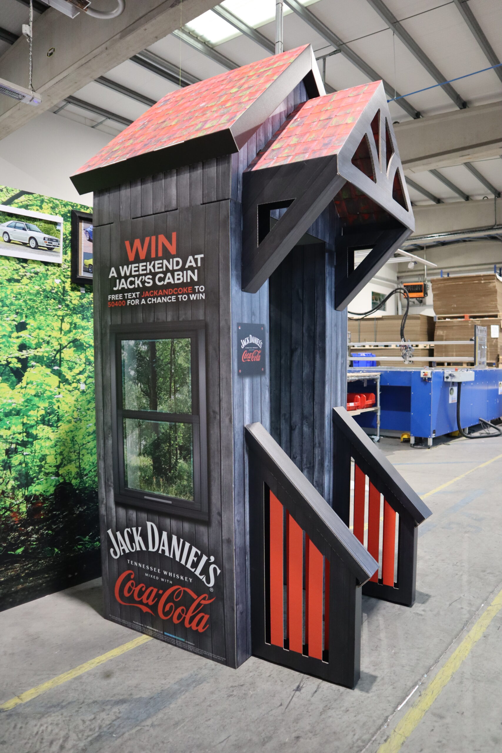 free standing display unit cardboard shaped as a wooden shed