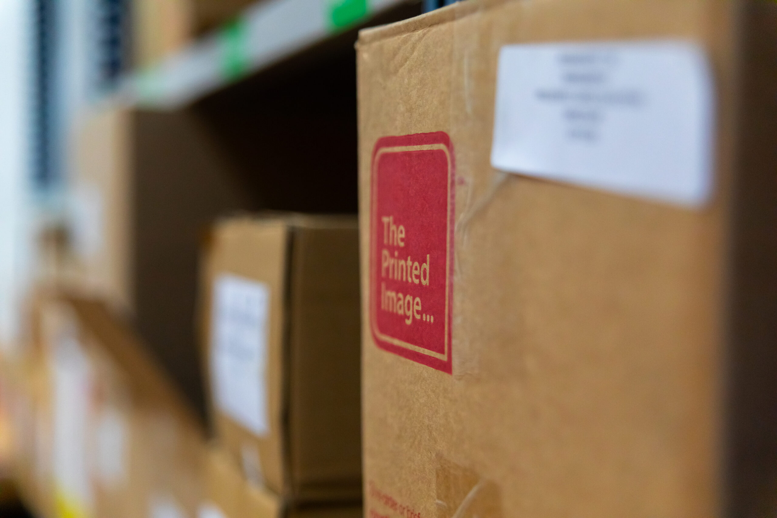 zoomed in box with the printed image logo in red
